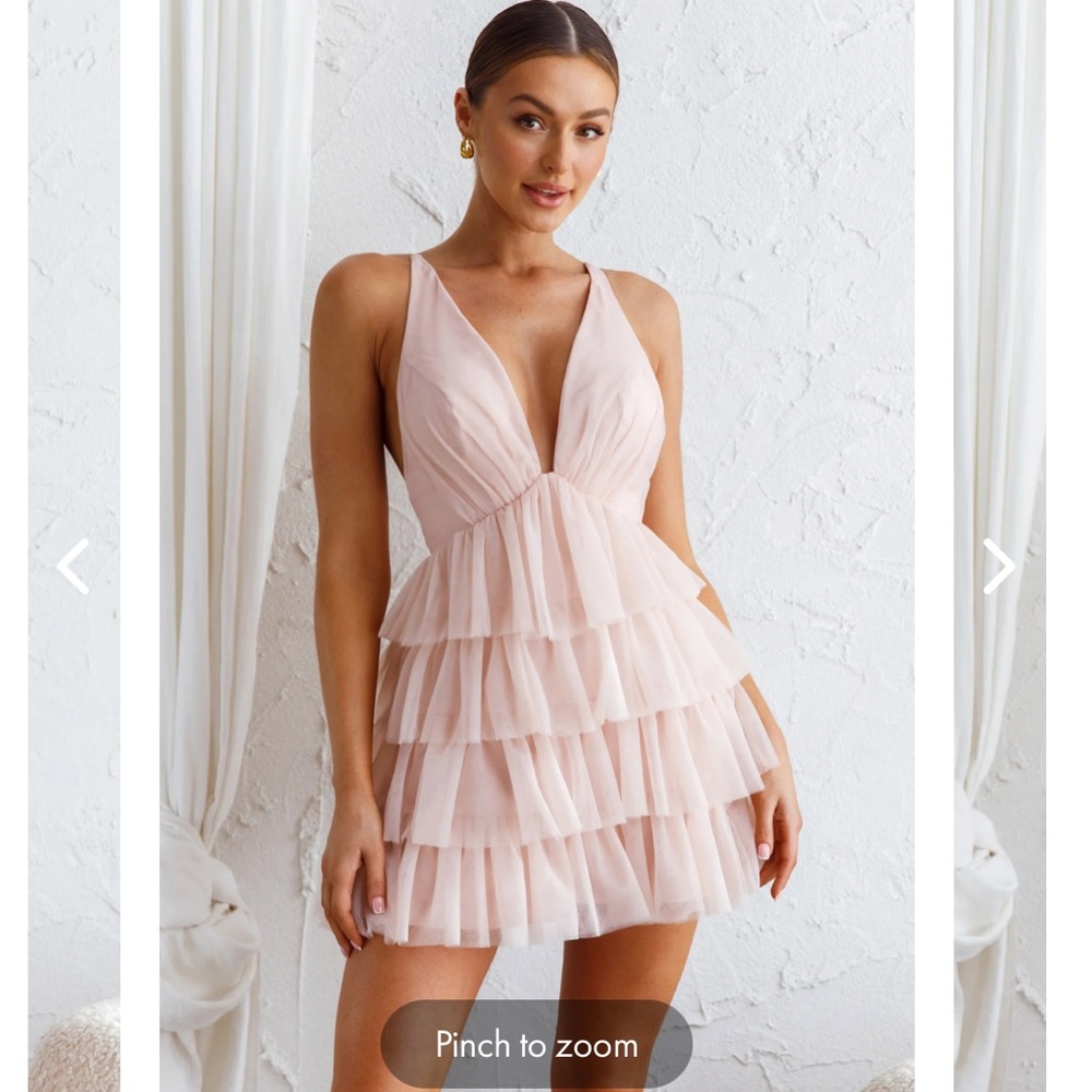 Brand new blush frill mini dress